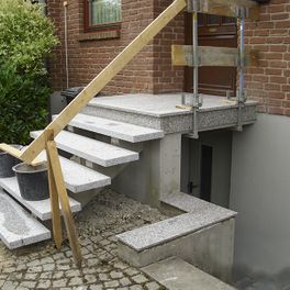 Treppe in Granit Tessmann Bau