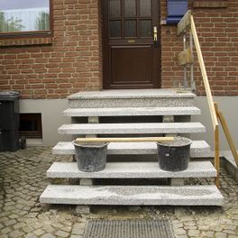 Treppe in Granit Tessmann Bau
